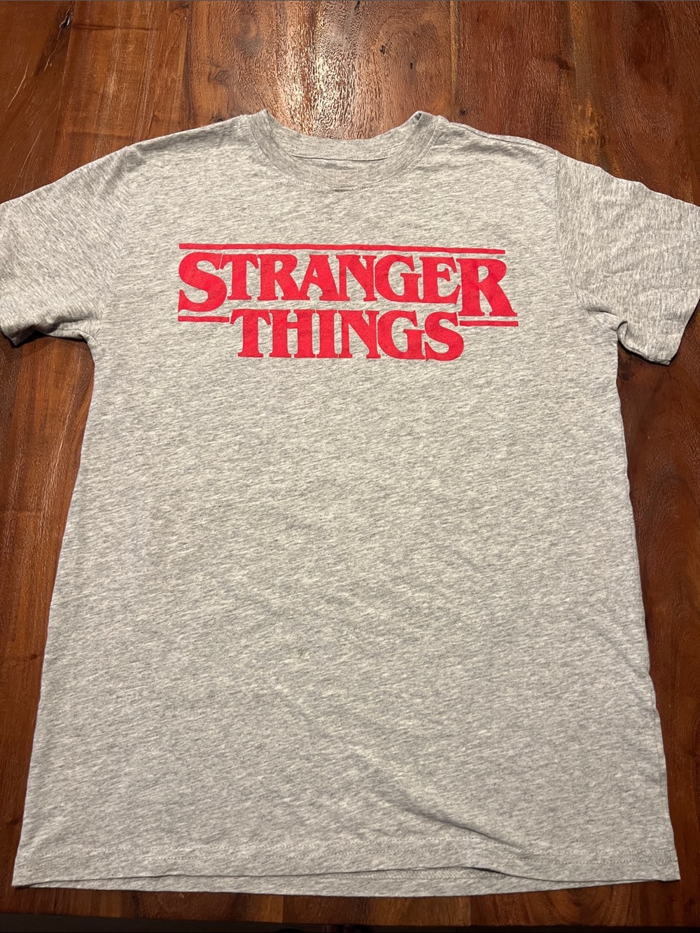 Stranger Things Logo Short Sleeve Tee in Heather Gray with Red Print